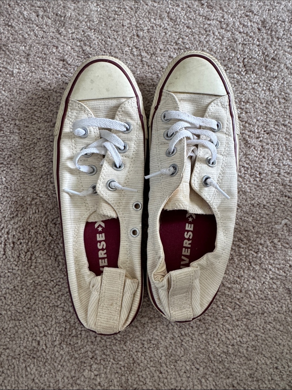 Converse Women’s Low Top Canvas Sneakers in Cream with Burgundy Trim